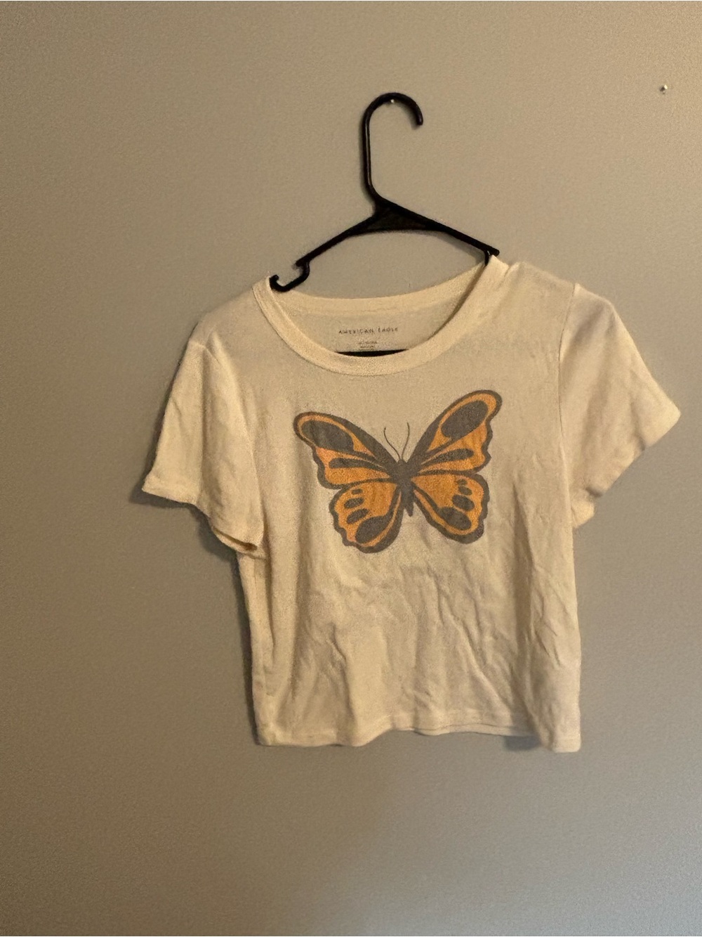 American Eagle Outfitters Cream Crop Top with Orange Butterfly
